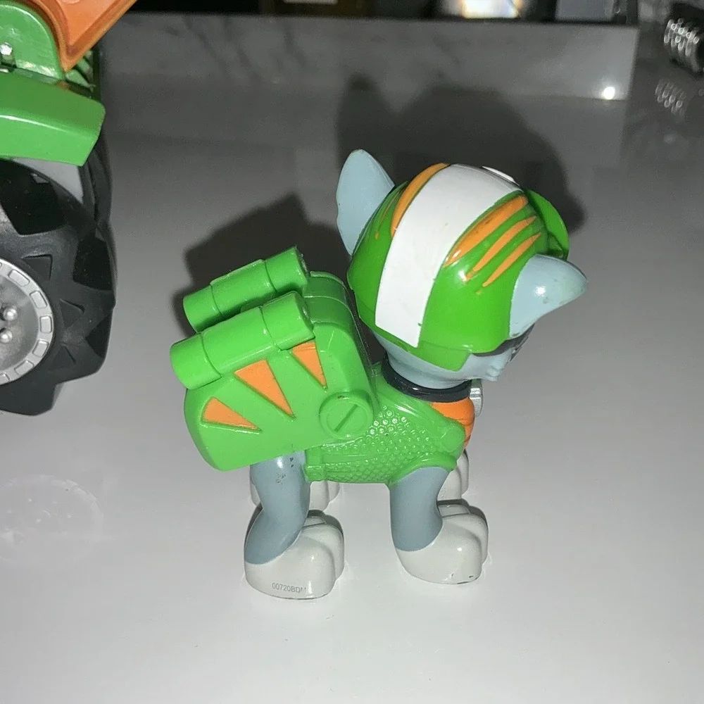 Paw Patrol Rocky Rev Up Deluxe Dino Rescue Vehicle with Dinosaur & Figure